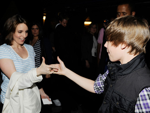 Tina Fey & Justin Bieber|Wha?! Liz Lemon and The Bieb have a secret handshake? When did they possibly find the time? Amazing!
