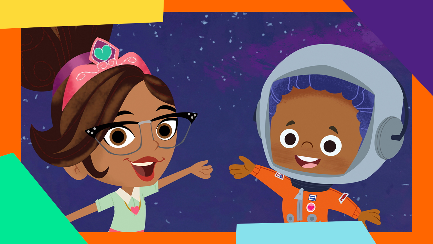 A young girl - representing Katherine Johnson - poses with a young boy in an astronaut suit.